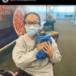 Purrxotics customer with adopted Sphynx kitten